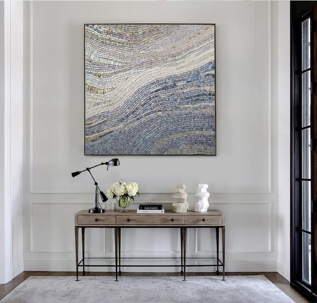 Modern mosaic wall art with abstract wave design in grey, silver, and cream colors on canvas