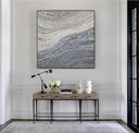 Modern mosaic wall art with abstract wave design in grey, silver, and cream colors on canvas
