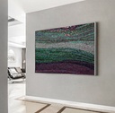 Green and purple abstract mosaic artwork on canvas with shimmering textures and bold color contrast