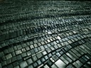 Long dark blue mosaic wall art with metallic silver texture on vertical canvas