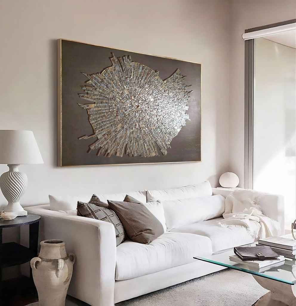 Modern fossil-inspired mosaic wall art with radial metallic texture on taupe-gray background