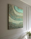 Green mosaic wall art featuring sage, teal, and gold tones with flowing textured rows of irregular rectangles