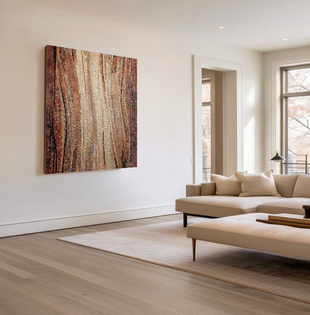 Mosaic wall art featuring a wave pattern in amber, brick, and brown tones with a creamy sand-colored center