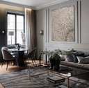 Large mosaic wall art with a radiant sunburst pattern in neutral and gold tones